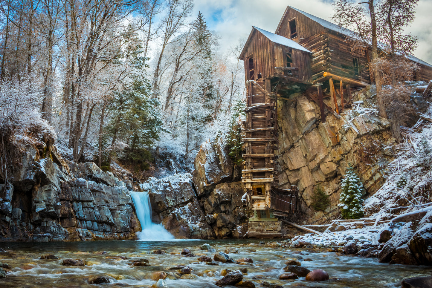 On the first snow of the season, deep in the rocky mountains, there lies a mill that once kept a community alive. The water flows clear like crystal, the mill stands like a sentinel, watching over its wild patch of the forest.