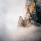 Rare mist fills Zion Canyon and makes the mighty walls look as if they are just in the process of being created. I waited hours for the mist to clear in this spot, and just as it did a light hole broke in the clouds and made the scene glow. 